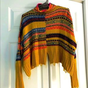 Beautiful Free People top S-XS. Distressed look. Vibrant colors.